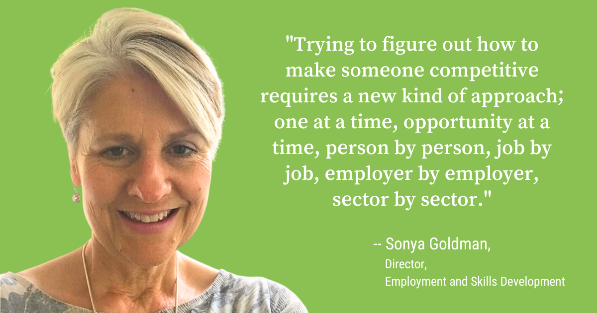 A woman with short blonde hair speaks about change in the world of work