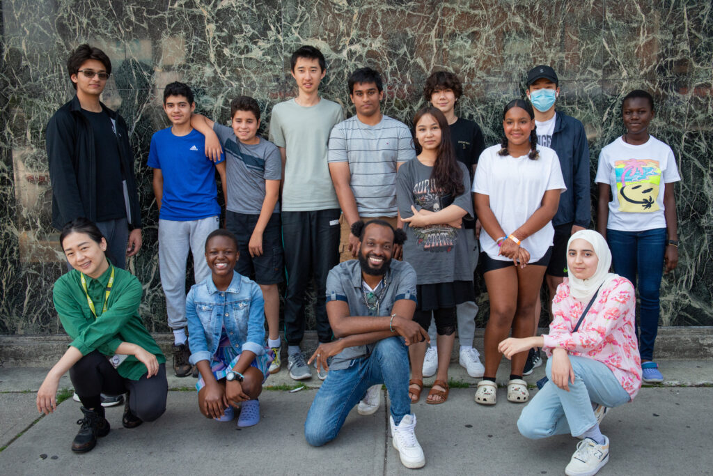 WoodGreen's Youth Wellness Centre day camp participants pose for a photo.