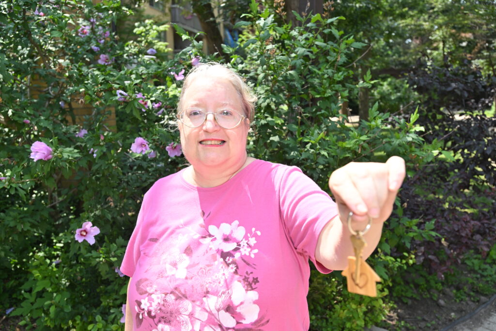Woman holding keychain